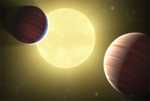 Ilustrace dvou planet o velikosti Saturnu na stejné oběžné dráze