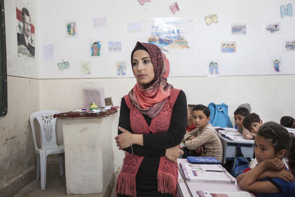 Učitelka Rihem ze syrského Aleppa.