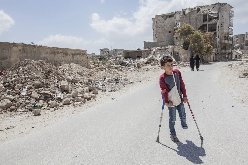 Jedenáctiletý Ahmed na cestě do školy v Aleppu.